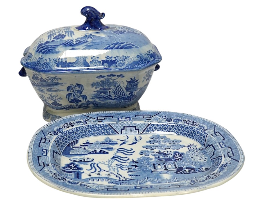 A Victorian Staffordshire blue and white pottery soup tureen and cover, together with a meat dish (2). Condition - tureen cover cracked